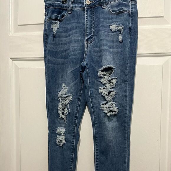 Ripped Jeans  - Picture 1 of 3
